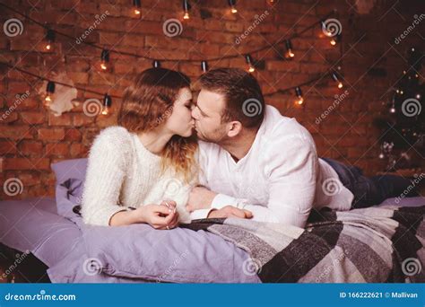 kissing in bed